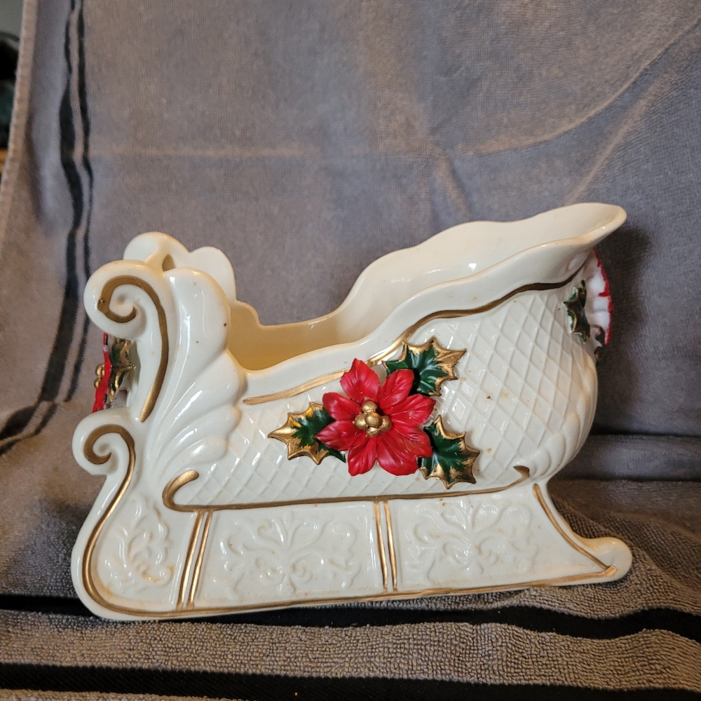 Festive Ceramic Sleigh with Poinsettia Design